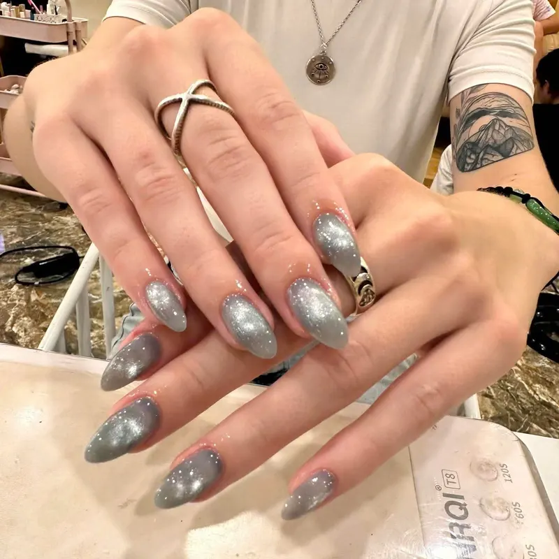 LENA Nails & Beauty Da Nang — Silver Chrome Mirror Almond Nails